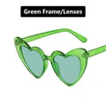 Sparkly green heart-shaped sunglasses with glitter frame and translucent green lenses - Green Frame / Green Lens