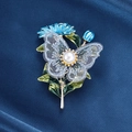 Exquisite butterfly flower brooch with blue enamel, mesh wings and a central pearl accent - Butterfly Flower Pearl Brooch / XD823080-1 Blue Butterfly