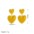 Orecchini a cuore dorati con trama stropicciata e dimensioni del prodotto incluse - Orecchini d'oro