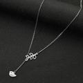 Silver stainless steel bird and leaf pendant necklace on textured black fabric - Steel Leaf & Bird