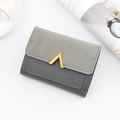 Women's trifold mini wallet in two-tone grey leather with elegant gold V-shape buckle - Gray
