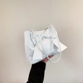 White minimalist tote bag with oversized bow detail in smooth synthetic leather finish - White