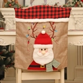 Christmas chair cover featuring Santa Claus design with red and black plaid linen accents - Santa Claus