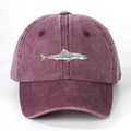 Close-up of the detailed grey shark embroidery on the burgundy washed cotton baseball cap - One Size / Burgundy