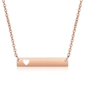 Minimalist rose gold bar necklace featuring a hollow heart cutout and delicate chain - Rose Gold
