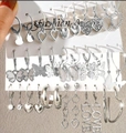 Silver earring set with leopard print hearts, butterfly studs, and love charms - Silver Butterfly Heart Letter 15-Pair Set (6617001HB)