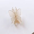 Minimalist beige matte butterfly hair claw clip with gold spring on white background - Frosted Khaki