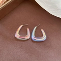 Close-up of iridescent acrylic U-shaped earrings on a brown velvet display tray - 925 Sterling Silver Earring Post/Acrylic / Iridescent Triangle