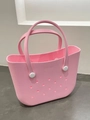Pink EVA beach tote with signature hole design and textured surface for outdoor use - Large / Pink