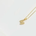 Minimalist golden necklace with a 3D letter H pendant featuring honeycomb texture - Letter H