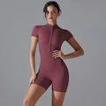 Close-up of women's short sleeve yoga bodysuit with front zipper and stand-up collar - S / Burgundy