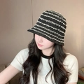 Women's woven straw bucket hat featuring classic black and white stripes for summer - L (54cm-58cm) / Black Frayed Hollow