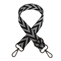 Detail of adjustable black and white V-pattern woven strap with metal swivel hooks - Black Gunmetal Buckle