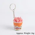 Creative popcorn bucket keychain with pink top and orange base, 6cm total height - Pink