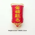 Detailed view of red pencil plush brooch with 6.5cm height and inspirational embroidery - Success in Exams / Adjustable