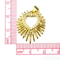 Macro detail of a golden heart pendant with zircons and ruler showing 2.5cm size - #5 Radiant Heart