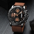Men's quartz business watch with black metal case, brown canvas strap, and date display - Brown