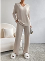 Beige two-piece rib-knit set featuring a V-neck long-sleeve top and wide-leg trousers - XS / Apricot