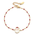 Dettaglio del ciondolo Babbo Natale e del marchio S.steel su bracciale in acciaio inossidabile - Rosso