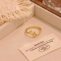 Golden open star ring with white shell inlay, made of copper weighing 2g and 0.8cm size - 7# Star
