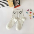 White mid-calf cotton socks featuring a ribbed texture and cute black embroidered smiley face - One Size / White Big Smiley