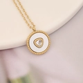 Macro shot of gold necklace with round shell pendant and triangle zircon stone - Gold Round Triangle Stone Style (7#)