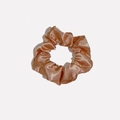 Close-up of the glossy satin fabric texture on a champagne gold pleated scrunchie - Satin 5 (Golden)