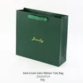 Elegant dark green gift bag with gold Jewelry text and ribbon handles, size 23x21x7cm - 23x21x7cm Handbag / Dark Green