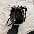 Modern geometric folding bucket bag with black and white color block leather panels - Black and White