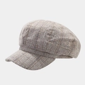 Detailansicht des grauen Vintage-Plaid-Tweedstoffs und der Nähte dieser achteckigen Mütze - Einheitsgröße / Beige Kariert