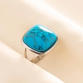 Macro shot of vintage silver ring with square blue turquoise and adjustable band - Silver Base-Dark Blue Stone
