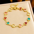 Chic gold chain bracelet featuring colorful heart-shaped stones in red, pink, and blue - Multicolor Heart (B1664)