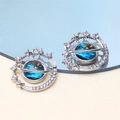 Macro shot of celestial star and planet earrings with blue starry sky inlay and reflections - Style 5-Planet Orbit
