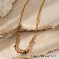 Detail view of gold layered necklace with colorful beads and star charm, 40.5-45.5cm length - LC40020-2 Gold Double Layer Star Necklace