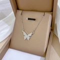 Minimalist matte butterfly pendant necklace in silver stainless steel on a brown gift box - Matte Butterfly Pendant Silver (N120)