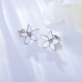 Elegant 925 sterling silver flower earrings with white enamel petals on silk background - 925 Silver / White