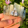 Detail of handmade wire wrapped hair comb with green crystals and silver bird skull - Prehnite + Silver Crow Skull