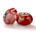 DIY charm set featuring two red transparent glass beads with pink heart patterns and silver cores - Red Heart