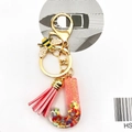 Detail of resin letter J keychain with pink tassel and enamel bee on white background - Letter J Bee Keychain