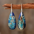 Macro detail of teardrop emperor stone earrings with blue mineral texture on wood - Blue + Silver Hook