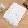 Close-up of white cotton gauze baby blanket with yellow floral prints and tassel fringe - 100*120 cm / Small Yellow Flower