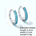 Minimalist silver circular earrings with blue zircon rectangle stones, 2.5cm diameter - Light Blue Zirconia
