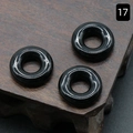 Polished 20mm black agate abacus beads with large 8mm holes on a dark wooden base - Obsidian