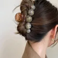 Minimalist coffee resin hair claw clip with marble beads on a female model - Coffee base with Starry Gray
