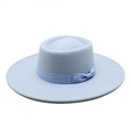 Close-up of light blue wool fedora hat featuring a matching ribbon bow and wide flat brim - One Size / Sky Blue