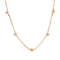 Minimalist gold star necklace featuring five sparkling pave-set star pendants - Gold