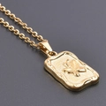 Golden stainless steel rectangle pendant necklace with embossed butterfly detail - Necklace / Gold