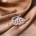 Rose gold swan brooch with white pearls and crystals on champagne silk background - Y-08 Elegant Swan Brooch