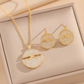 Elegant gold necklace and earrings set featuring circular X-shaped sparkling crystals - Gold Jewelry Set (8915)