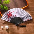 Chinese folding fan with white silk surface, red plum blossom prints and black tassel - 09 River Plum Blossom